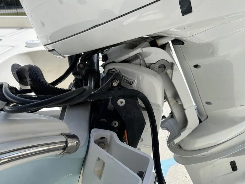 Slide: The Image of Close-up of a 2016 Avenger AV 26 boat engine components. - 12