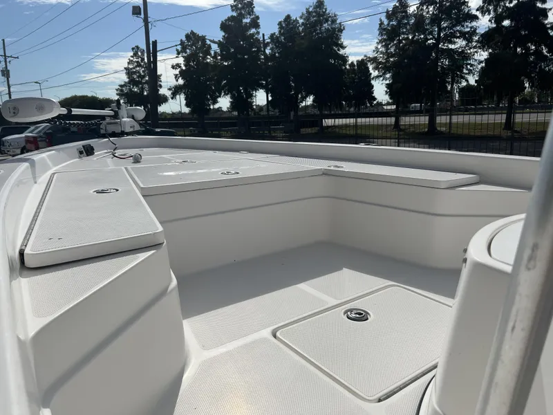 Slide: The Image of 2007 Skeeter ZX 24 Bay boat deck with storage compartments and seating. - 15