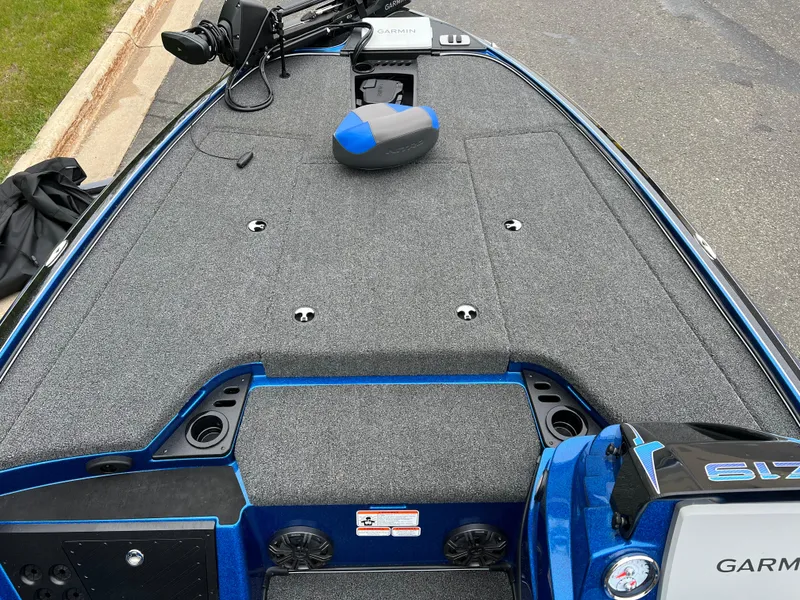 Slide: The Image of 2025 Nitro Z19 Pro boat dashboard with Garmin display and steering wheel. - 6