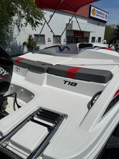 Slide: The Image of 2025 Tahoe T18 boat with sleek design, showcased at Tracker Boat Service Center. - 9