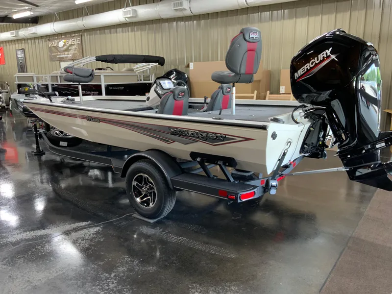 Slide: The Image of 2025 Ranger RT188 boat with Mercury engine on display in showroom. - 4