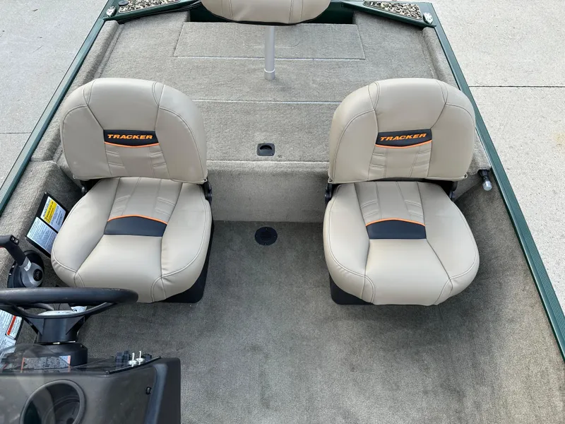 Slide: The Image of 2025 Tracker Bass Tracker Classic Limited boat seats, beige upholstery, dual seating arrangement. - 5