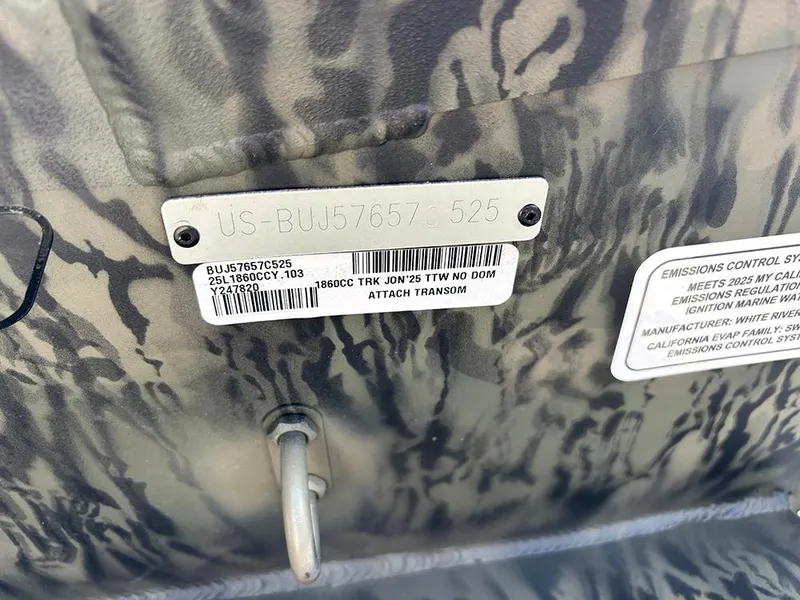 Slide: The Image of 2025 Tracker Grizzly 1860 CC boat identification and emission control labels. - 19