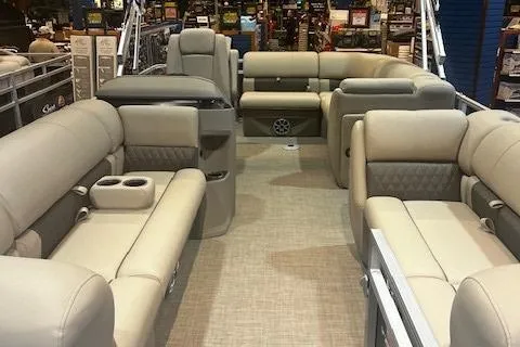 Slide: The Image of 2025 Sun Tracker Party Barge 20 DLX interior with spacious seating and modern design. - 2