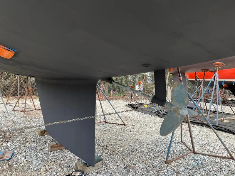 Slide: The Image of Bottom view of a 2004 ShearWater 45 sailboat, showing keel and propeller. - 16