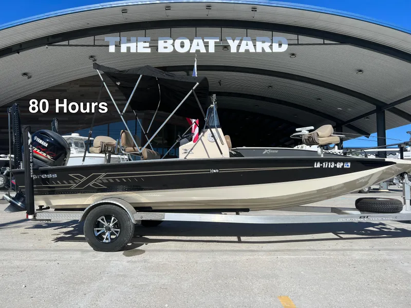 Slide: The Image of 2023 Xpress H20 BAY boat at The Boat Yard, 80 hours used, on trailer. - 0