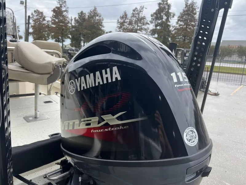 Slide: The Image of 2023 Xpress H20 BAY boat with Yamaha 115 four-stroke outboard motor. - 14