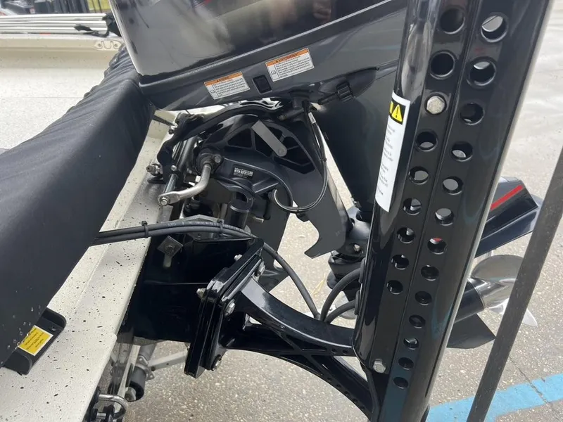 Slide: The Image of 2023 Xpress H20 BAY boat motor and propeller detail, showcasing mechanical components. - 16