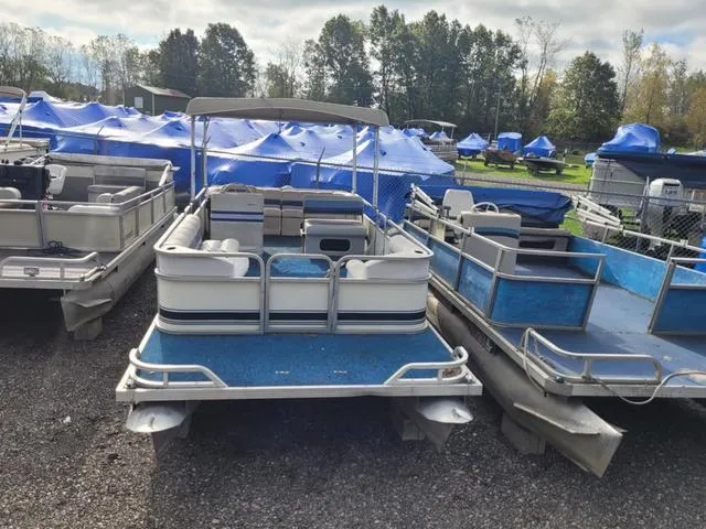 Slide: The Image of Manitou w/ 50HP Honda 1990 - 1