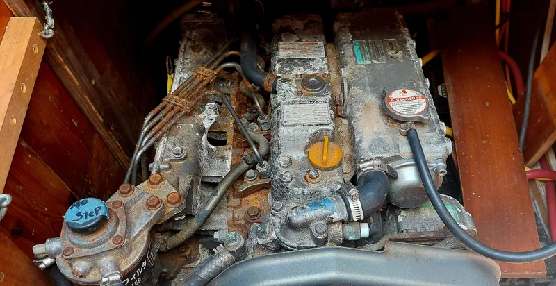 Slide: The Image of Engine of a 1955 Concordia 41 Yawl, showing detailed mechanical components. - 10