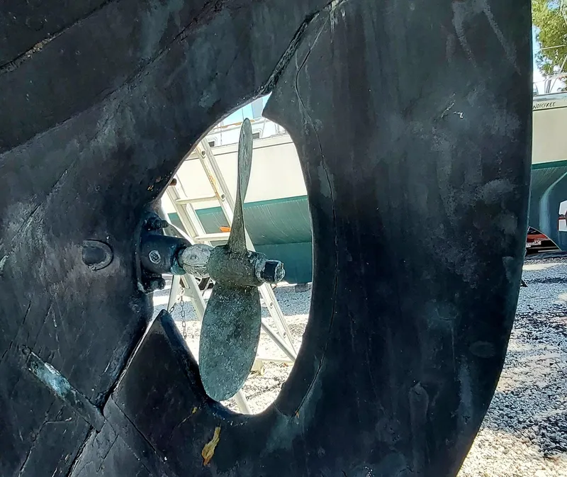 Slide: The Image of Propeller of 1955 Concordia 41 Yawl sailboat, viewed through hull opening. - 15
