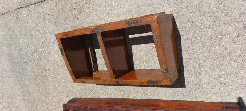 Slide: The Image of Wooden frame from a 1955 Concordia 41 Yawl, displayed on a concrete surface. - 19