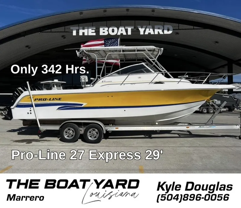 Slide: The Image of 2001 Pro-Line 27 Express boat with trailer, only 342 hours, at The Boat Yard, Marrero. - 0
