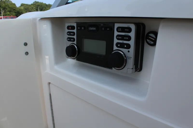 Slide: The Image of 2011 Chaparral 264 Sunesta boat stereo system with control panel. - 14