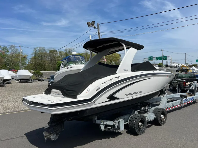 Slide: The Image of 2011 Chaparral 264 Sunesta boat on trailer, covered and ready for transport. - 8