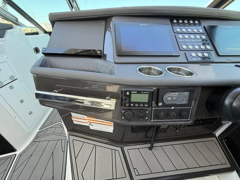 Slide: The Image of Control panel of a 2020 Monterey 385 Super Express boat with modern navigation equipment. - 41