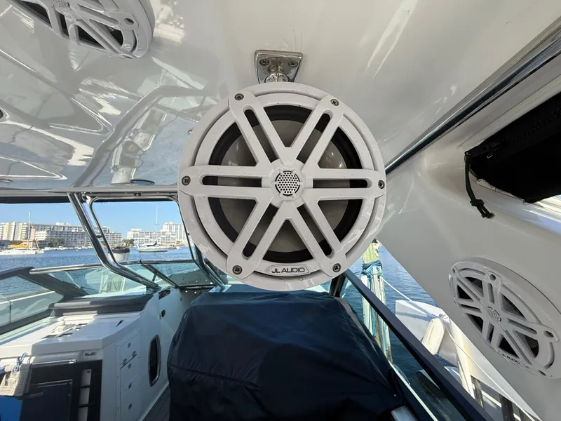 Slide: The Image of 2020 Monterey 385 Super Express boat with JL Audio speaker system. - 56