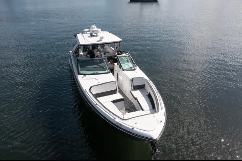 Slide: The Image of 2020 Monterey 385 Super Express boat on calm water, aerial view. - 7