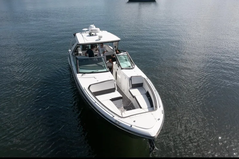 Slide: The Image of 2020 Monterey 385 Super Express boat on calm water, aerial view. - 9