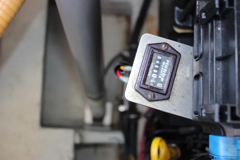 Slide: The Image of Hour meter on a 2004 Chris-Craft Corsair 25 boat engine. - 36