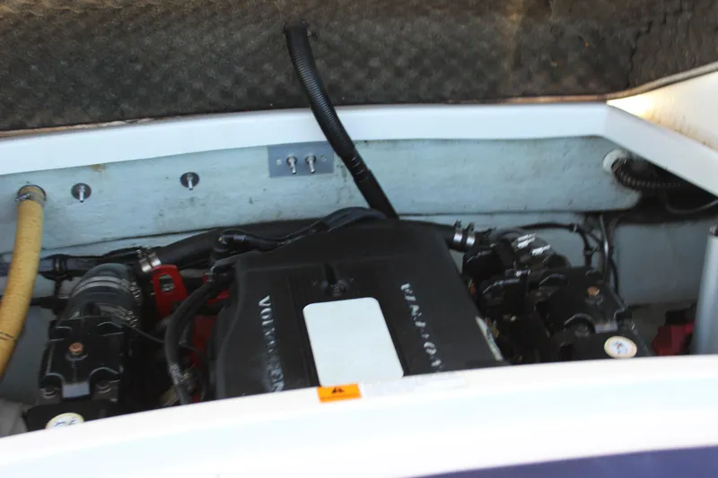 Slide: The Image of Engine compartment of a 2004 Chris-Craft Corsair 25 boat. - 38