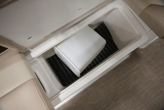 Slide: The Image of 2016 Formula 290 Bowrider storage compartment with cushion inside. - 13