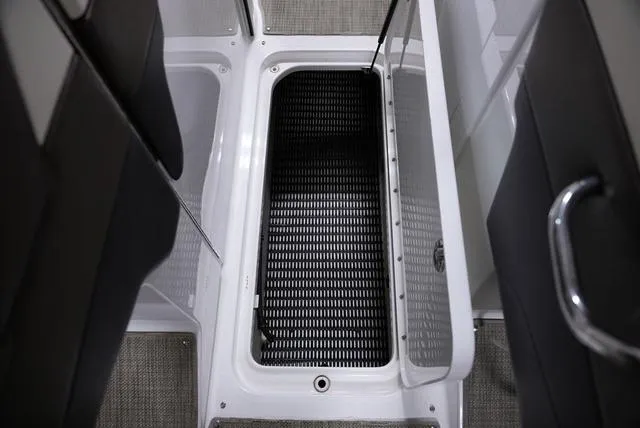 Slide: The Image of 2016 Formula 290 Bowrider interior with black non-slip flooring and seating. - 22