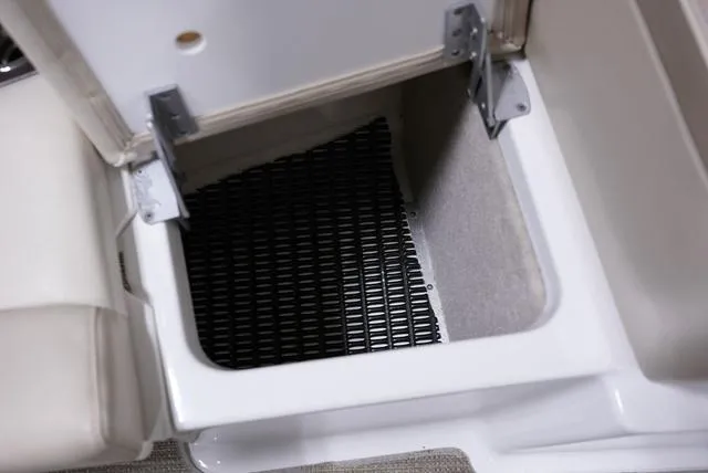 Slide: The Image of Open storage compartment in 2016 Formula 290 Bowrider boat. - 25