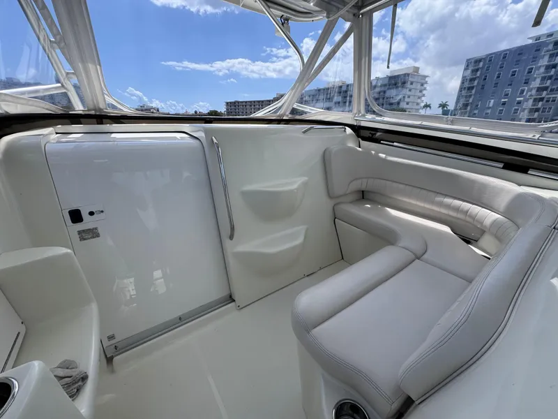 Slide: The Image of 2006 Hydra-Sports 33VX boat interior with white seating and modern design. - 15