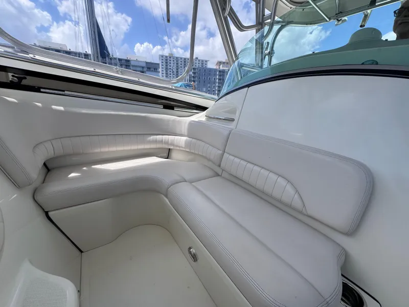 Slide: The Image of 2006 Hydra-Sports 33VX boat interior with white leather seating and modern design. - 16