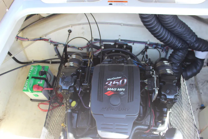 Slide: The Image of Engine compartment of a 2005 Larson LXi 268 with MerCruiser 350 MAG MPI engine. - 10