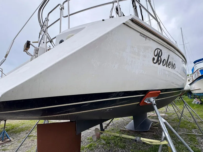 Slide: The Image of Catalina 42 MkII sailboat from 1989 on dry dock, named "Bolero." - 6