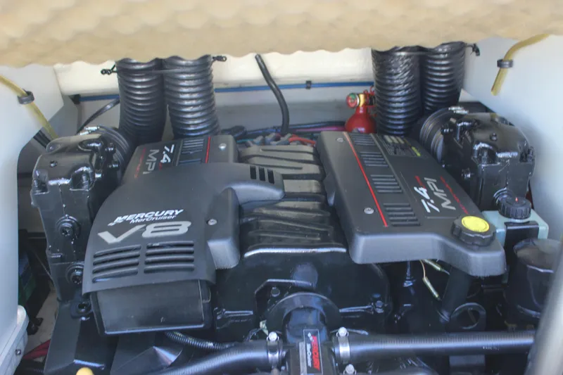 Slide: The Image of Engine compartment of a 2001 Sea Ray 260 Sundeck with a Mercury V8 engine. - 27
