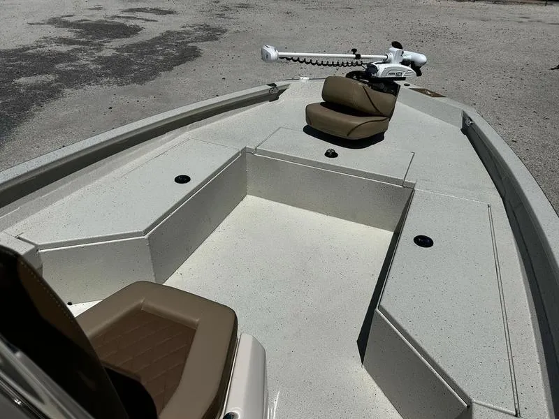 Slide: The Image of 2025 Xpress H22B boat interior with seating and trolling motor. - 7