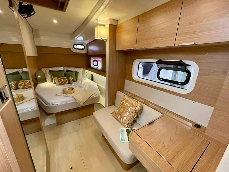 Slide: The Image of Luxurious interior of 2026 Bali CATSPACE yacht with cozy bedroom and modern furnishings. - 15