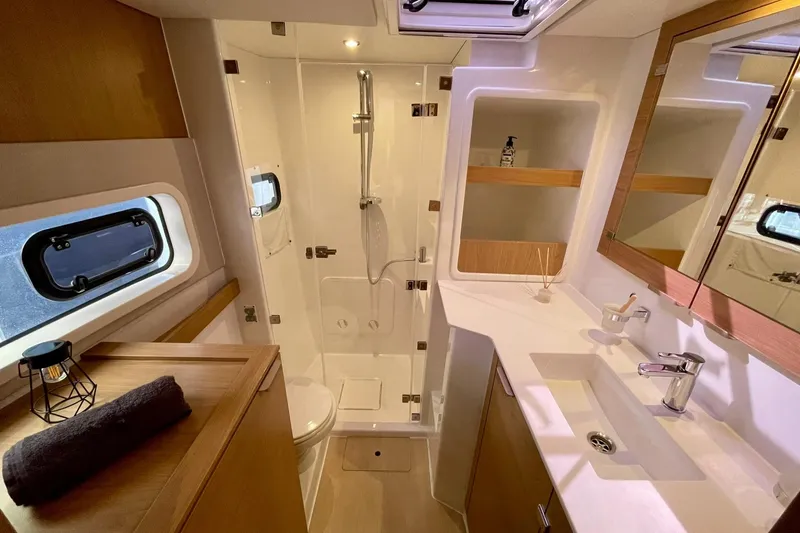 Slide: The Image of Modern bathroom in 2026 Bali CATSPACE yacht with shower, sink, and window. - 20