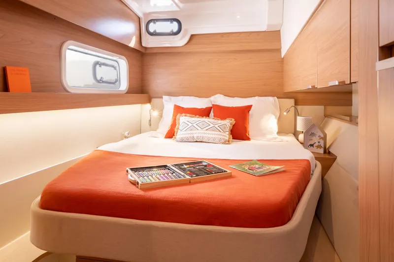 Slide: The Image of Luxurious cabin interior of 2026 Bali CATSPACE yacht with cozy bed and modern decor. - 26
