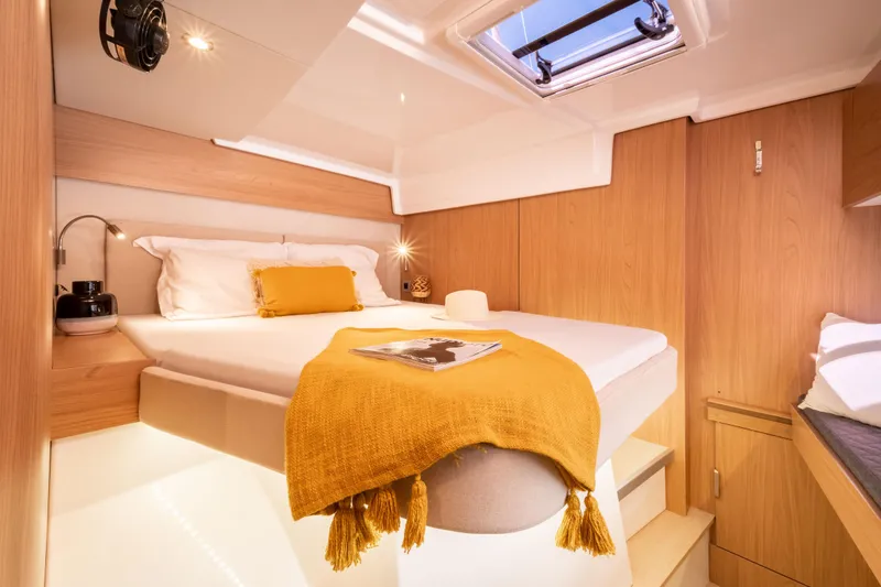 Slide: The Image of Luxurious cabin interior of 2026 Bali CATSPACE yacht with cozy bedding and modern design. - 28