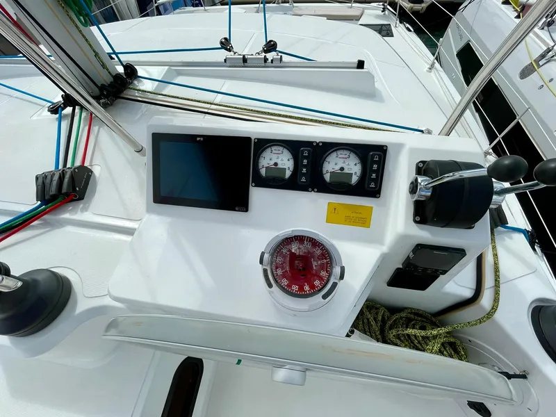 Slide: The Image of Helm station of 2026 Bali CATSPACE catamaran with navigation instruments and compass. - 45