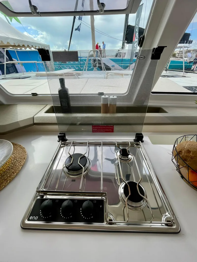 Slide: The Image of Modern kitchen stove on 2026 Bali CATSPACE yacht with ocean view. - 7