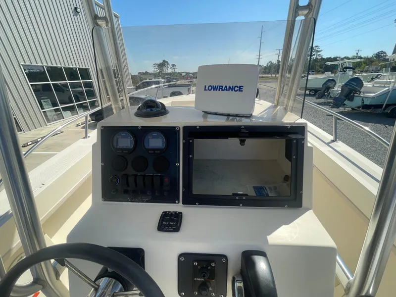 Slide: The Image of KenCraft Challenger 215 boat dashboard with Lowrance navigation system, 2000 model. - 11