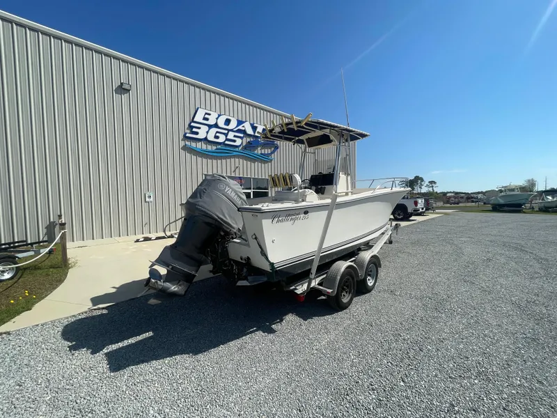 Slide: The Image of 2000 KenCraft Challenger 215 boat on trailer, parked outside Boat 365 building. - 7