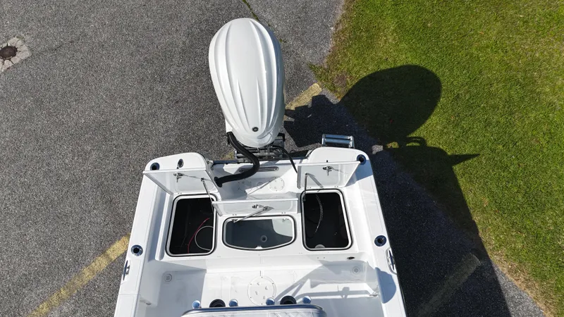 Slide: The Image of Overhead view of a 2025 BlackJack 224 boat with open storage compartments. - 10