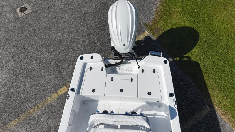 Slide: The Image of Top view of a 2025 BlackJack 224 boat with an outboard motor. - 11