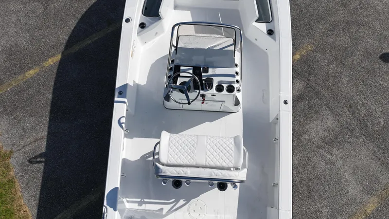 Slide: The Image of Top view of 2025 BlackJack 224 boat with sleek white interior design. - 13