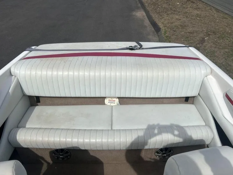 Slide: The Image of Rear seating area of a 2001 Chaparral 200 SSe boat with white upholstery. - 5