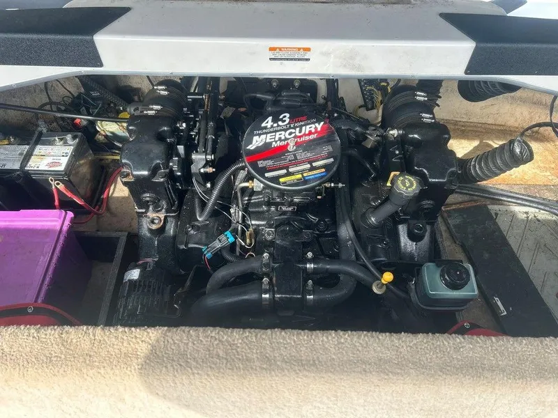 Slide: The Image of 2001 Chaparral 200 SSe boat engine compartment with Mercury Marine 4.3L engine. - 7