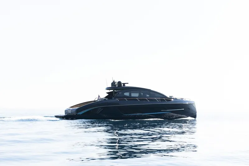 Slide: The Image of 2023 Lazzara LSX yacht cruising on calm ocean waters. - 32