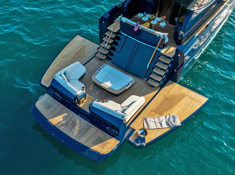 Slide: The Image of Luxurious 2023 Lazzara LSX yacht with spacious deck and elegant seating on the water. - 4