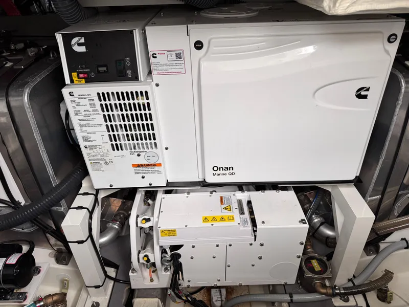Slide: The Image of Engine room of 2023 Prestige 520 F-Line yacht with Onan Marine generator. - 22